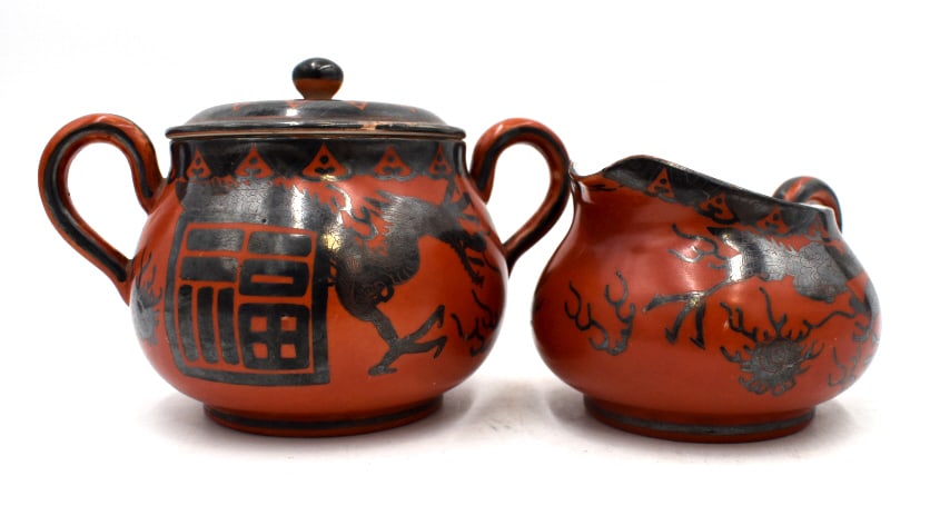 Porcelain Cream and Sugar Set: Cream pitcher is 2.75 inches tall by 4.25 inches tall and Sugar bowl is 4 inches tall by 5.5 inches wide, marked on bottoms, no damage, see photos.