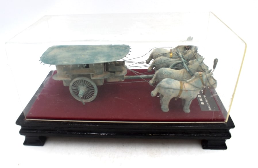 Bronze Chariot and Horses: 5.25 inches tall by 10 inches long, 4 horses pulling Chariot, made of Bronze, in display case with stand, no damage, please see photos.