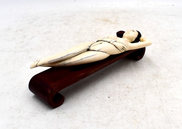 Porcelain Asian Woman Resting on Stand: 5 inches long by 1.5 inches tall, no damage, unmarked, w/ stand, see photos.