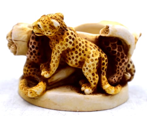 Leopard Carved Signed Bowl: 2.5 inches long by 1.75 inches tall, no damage, marked on bottom rim, sticker on bottom, please see photos.