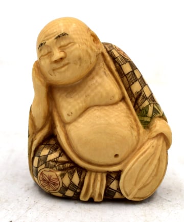 Japanese Resting Man Signed Netsuke: 2 inches tall by 1.5 inches wide, no damage, marked on foot, please see photos.