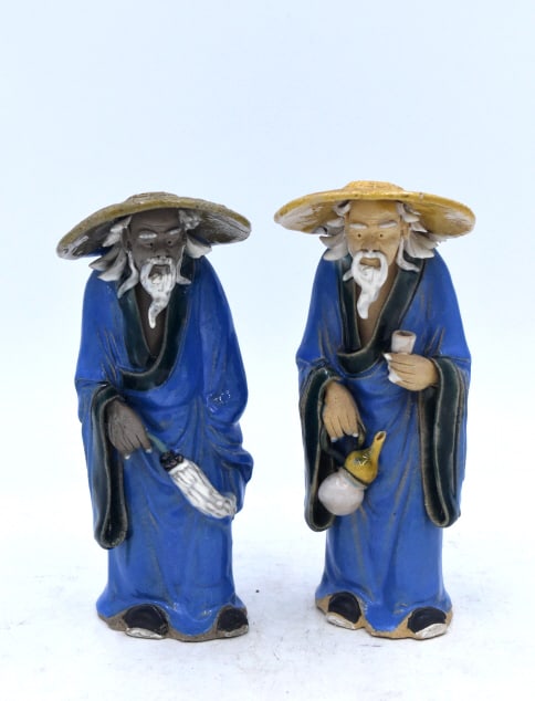 Pair of Chinese Wanderer Statues: 7 inches tall by 3 inches wide, stamped on bottom, cracking on hats, please see photos.