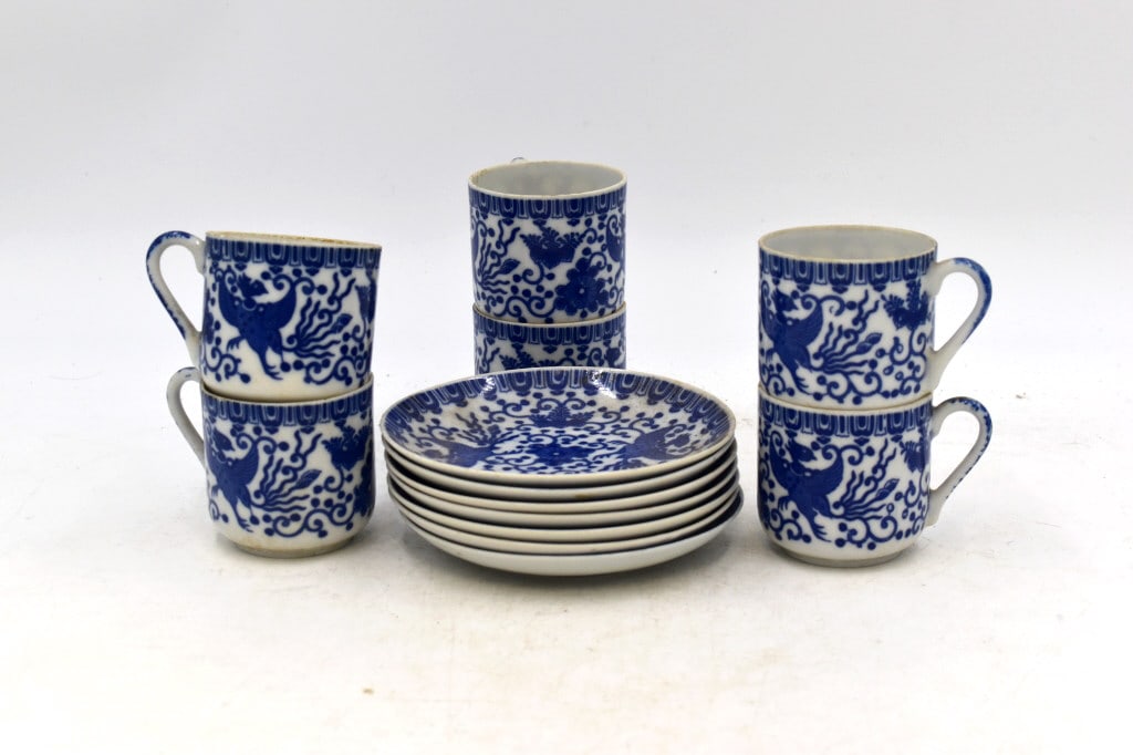 Asian Porcelain Tea Set: 7 plates and 6 cups, plates are 4.5 inches wide by .5 inches tall, cups are 2.5 inches tall by 3 inches wide, no damage, unmarked, please see photos.