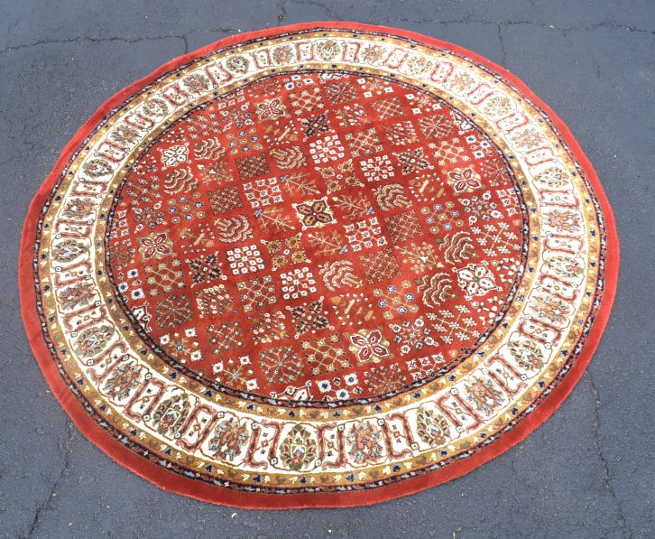 Round Red Rug: 8 feet in diameter, please see photos