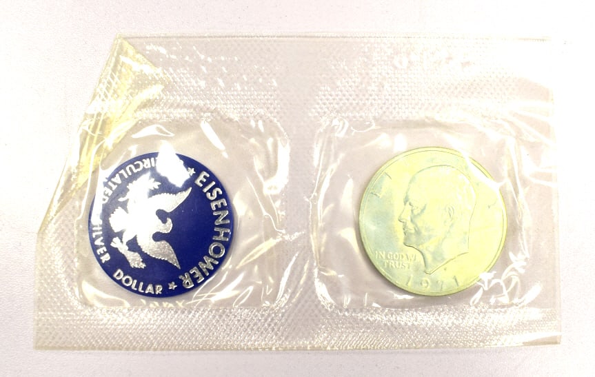 1971 Uncirculated Eisenhower Dollar: New in sealed wrapper, US coin, please see photos.