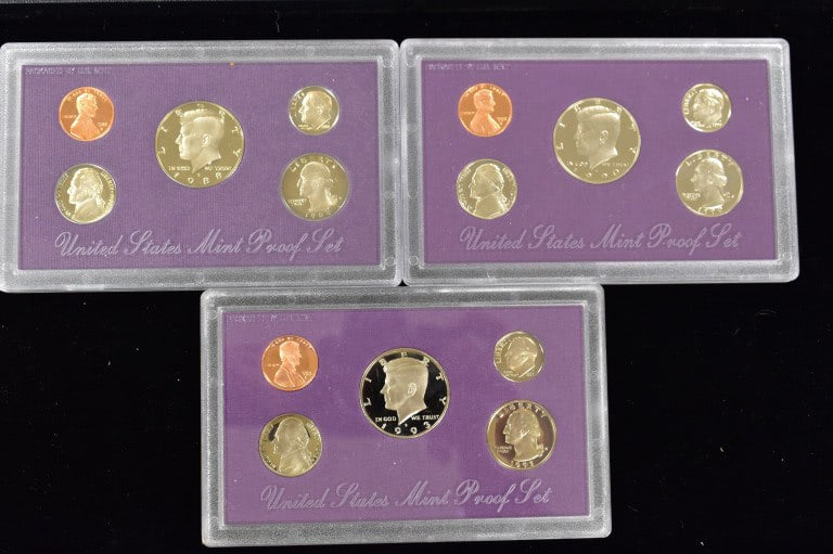 3 Assorted US Coin Proof Sets: 3 individual sets, one from 1988, 1990, and 1993, in original boxes and encased in plastic, please see photos.