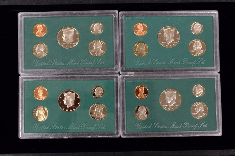 4 US Coin Proof Sets: 4 encased Sets of US Proof coins, 1997, 1996, 1995, and 1994, please see photos.