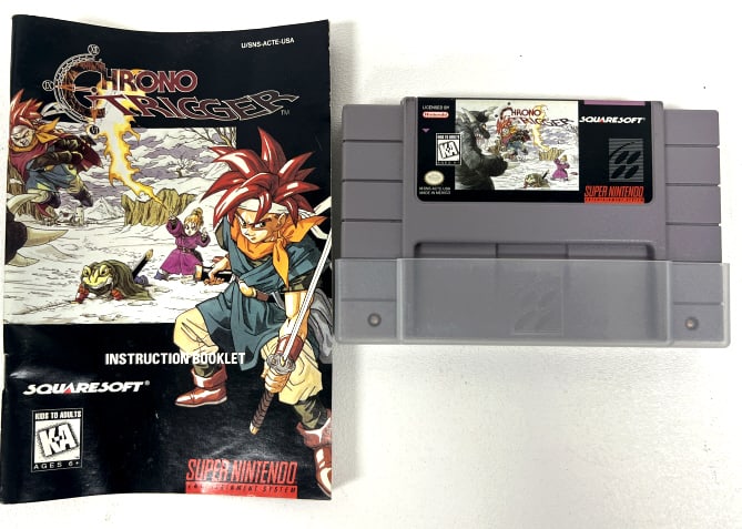 Chrono Trigger SNES Game: Chrono Trigger cartridge and instruction booklet. 1995 North American Release
