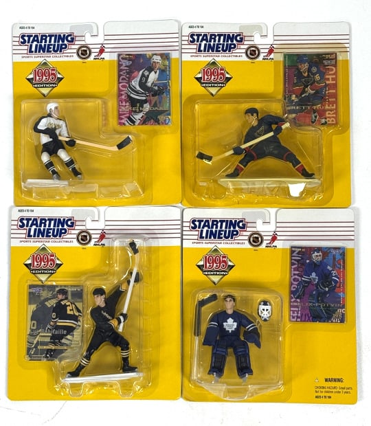 4- 1995 Kenner Starting Lineup NHL Figurines: Card and bubble sealed, including: Mike Modano, Luc Robitaille, Brett Hull, and Felix Potvin, see photos