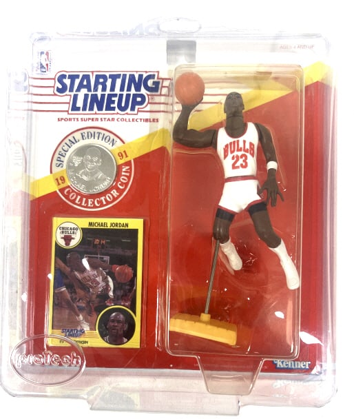 1991 Michael Jordan- Starting Lineup Figurine: Figure with stand, coin, and card sealed in original packaging with extra protective plastic container.