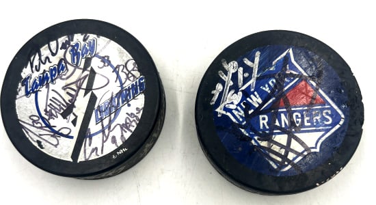 Tampa Bay Lightning & NY Rangers Signed Pucks: Each puck has multiple signatures from players. A few recognized players include Manon Rh?aume, Ben Bishop, & Brandon Hagel. See photos for condition.
