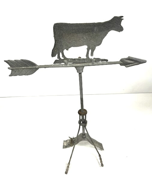 Cow Weathervane with Roof Bracket: 21x29.25 inches. Either cast iron or zinc, used for farm buildings. Has aging wear. See photos