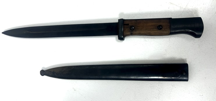 WWII Kar98k Bayonet: German military bayonet with steel blade. Comes with original steel scabard and frog stud attachment.Slight wear. See photos.
