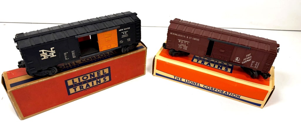 2 Lionel Model Train Cars: Postwar New Haven Boxcar No.6464-425 and Minneapolis & St. Louis Boxcar No. 6464 (box does not match the contents). See photos
