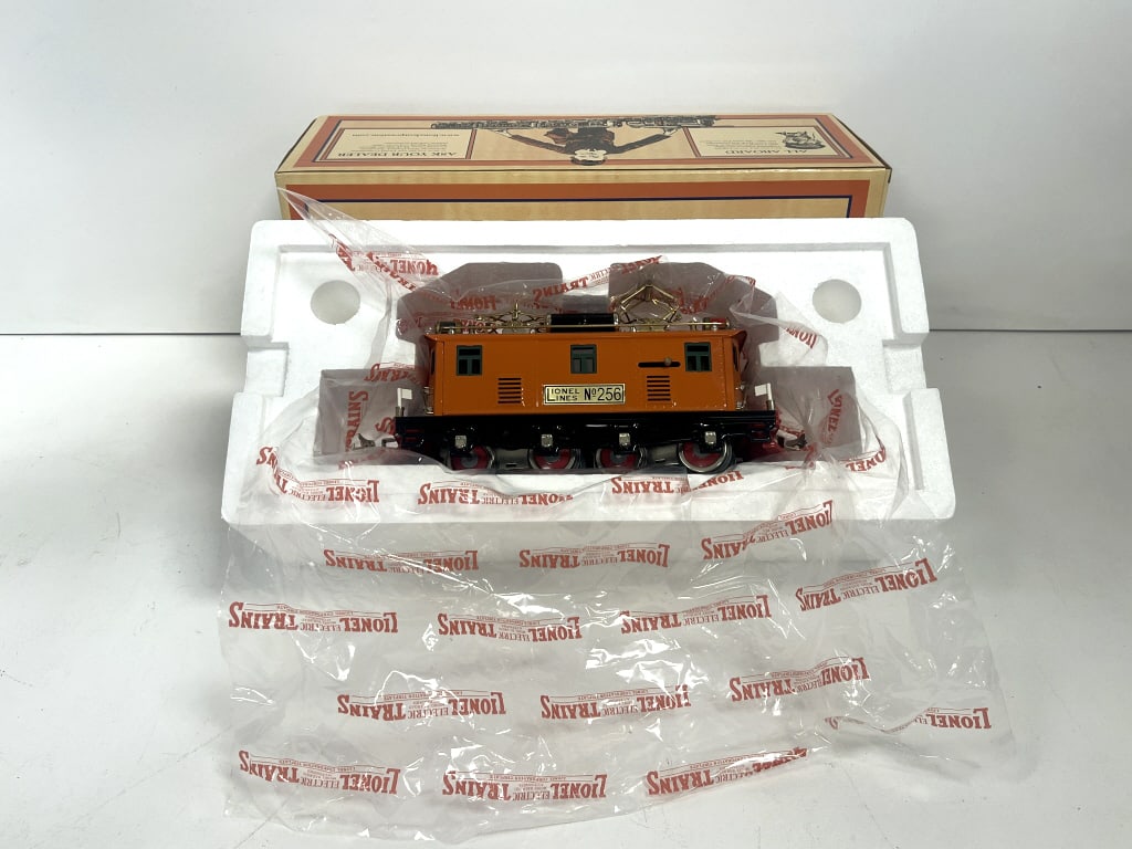 Lionel #256 Tinplate Orange Electric Engine: No.11-6028-0, with original packaging. See photos