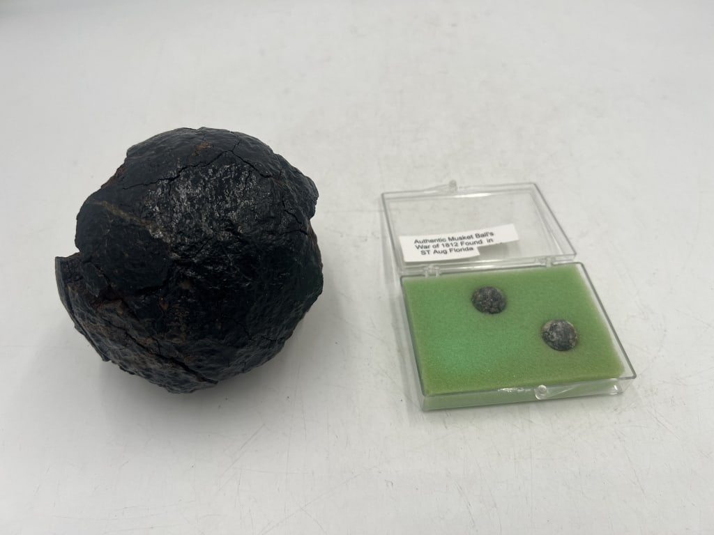 Cannonball & Musket Balls: Incomplete cannonball measuring 5inches in diameter and 8lbs. 2 Musket balls with info card that they are from War of 1812. Heavy wear. See photos