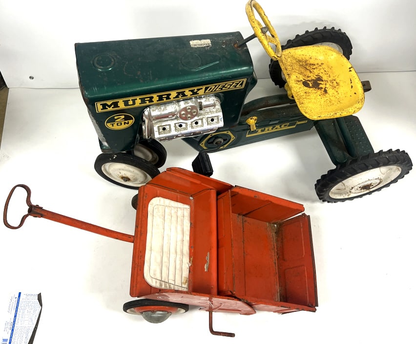 Murray Diesel Tractor & Dump Trac Tow Set: 70x28x22 inches, Murray "Diesel" 2 Ton Pedal Tractor & "Dump Trac" Tow-Behind Trailer Set. Sold as is. Please see photos