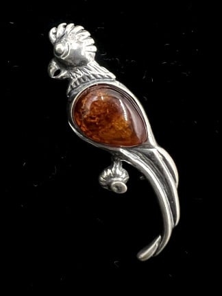 Silver-Toned Parrot Broach with Amber: 1.5x0.5 inches. Unmarked, non-magnetic. See photos