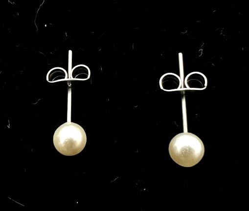 Pearl Earrings: See photos