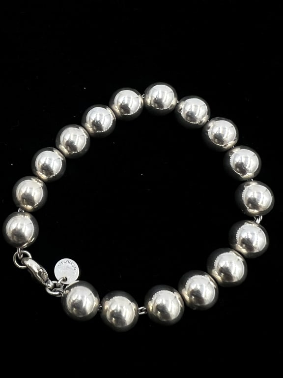SS Tiffany Beaded Bracelet: 7 inches length, clasp works. 18.3 grams total weight, See photos
