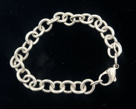 SS Tiffany Oval Link Charm Bracelet: 7 inches, no charms included, clasp works total weight 27 grams, See below photos