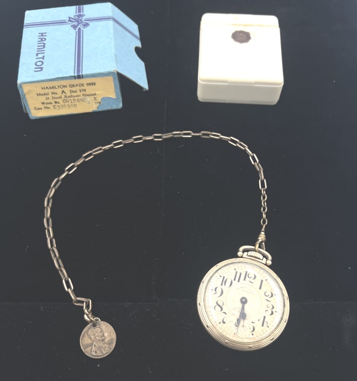Hamilton Railway Special Pocket Watch: 16 inches full length, size 16s, 21-jewel, grade 992b, 10k gold-filled casing, original box and chain. Has aged wear and cracking on inner face. Not running and untested. See photos