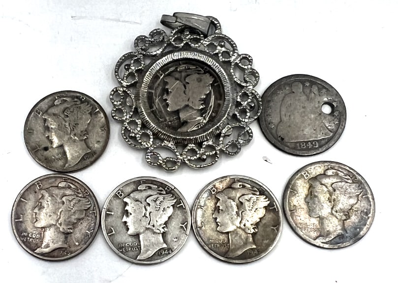 6 Mercury Dimes & 1 Seated Liberty Dime: 1849 Seated Liberty dime (holed). 6 Mercury Dimes with years that include: 1919, 1928(in jewelry frame), 1936, 1942, 1944, 1945. See photos