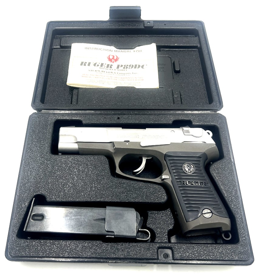 Ruger P89DC 9mm Pistol: 4.5 inch barrel length, comes with original case and manual. See photos