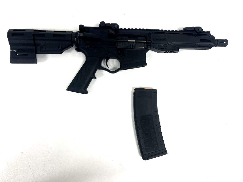 ATI Alpha Max AR-Style Pistol: .223 Remington, semi-automatic, flip-up sights, 30 round magazine. See photos
