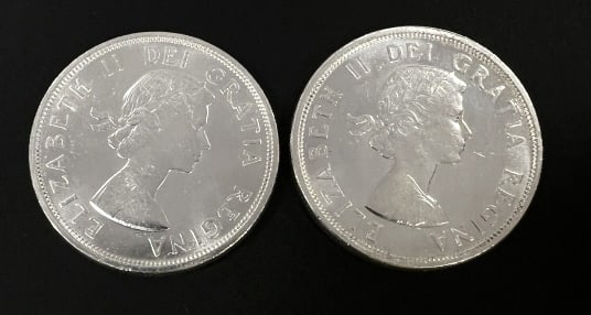 2 Anniversary Canadian Silver Dollars: Commemorative coin celebrating 100th anniversary of conferences in Charlottetown and Quebec. See photos