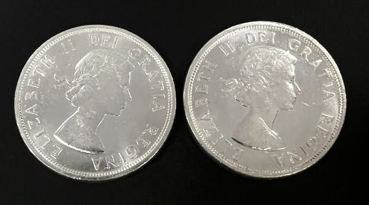 2 Anniversary Canadian Silver Dollars: Commemorative coin celebrating 100th anniversary of conferences in Charlottetown and Quebec. See photos