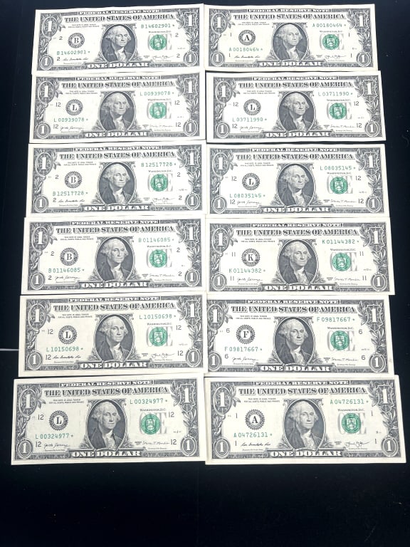 12 - One Dollar Star Notes: $1, Assorted years and serial numbers. See photos