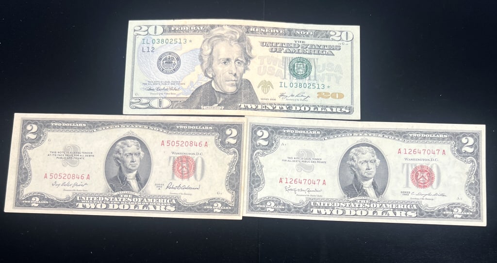 1-Twenty Dollar Star & 2-Two Dollar Notes: $2, $20. 2 Red seals two dollars and 1 Twenty dollar Star note. See photos