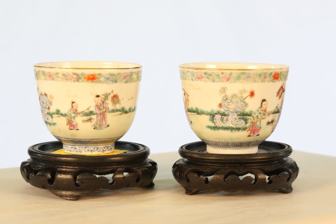 Pr of Chinese Matched Semi-eggshell Porcelain Cups: 19th century, pair of Chinese matched cups, motif of boys playing amidst goats, millefleurs upper border, w/lighting (Lei) fret, signed on base in fourncharacters " Luck comes where the Qilin steps", 