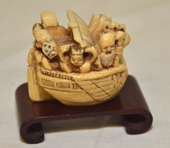 IVORY NETSUKE: Noahs Ark, signed on bottom, 1 1/2" wide by 1 1/4" tall