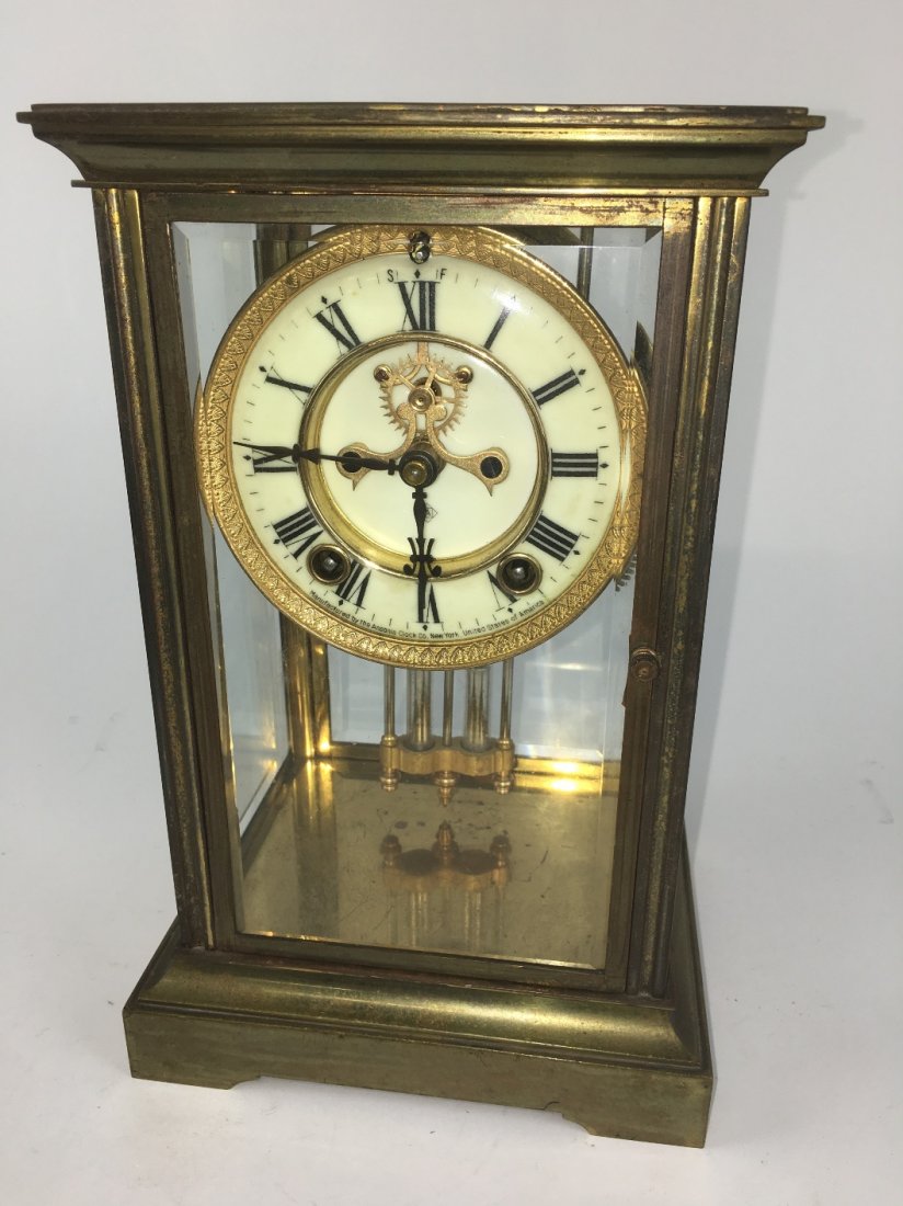 ANSONIA CLOCK CRYSTAL REGULATOR CLOCK: Brass with beveled glass panels all around, 10.75" tall by 7" wide