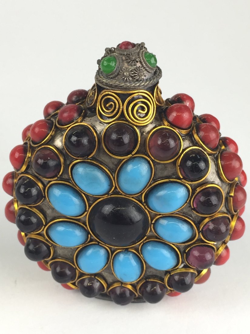 SNUFF BOTTLE ADORNED WITH MULTI COLORED STONES: Round shap, 3" tall