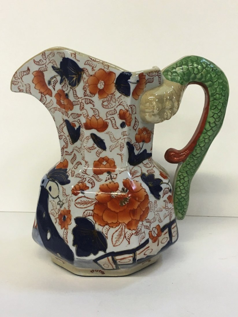 IRONSTONE DRAGON HANDLE PITCHER: Orange/blue, marked on bottom, 8.5" tall