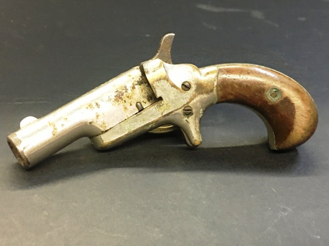COLT SINGLE SHOT DERRINGER MODEL 41: 5" across