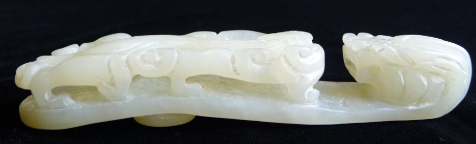 Antique Carved white Jade Belt Hook: Antique Carved white Jade Belt Hook, depicting a chilong and a dragon. Size:11.5 x 2.5 cm