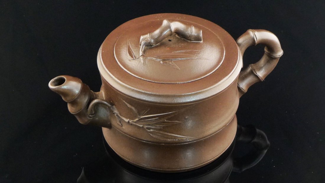 Chinese Yixing Clay Teapot: Chinese Yixing Clay Teapot with bamboo design, and a seal mark on the bottom, 3.5" x 7" x 4".