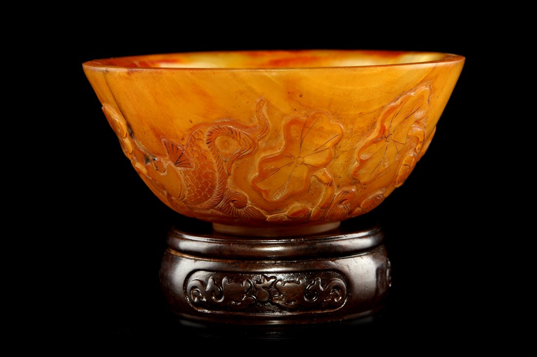 Chinese Cow Horn Bowl: Chinese Cow Horn Bowl, designed with carved fish and lotus means surplus year after year, 2.4" height, 4.8" diameter, 201.19g. (The base is only for exhibition using).