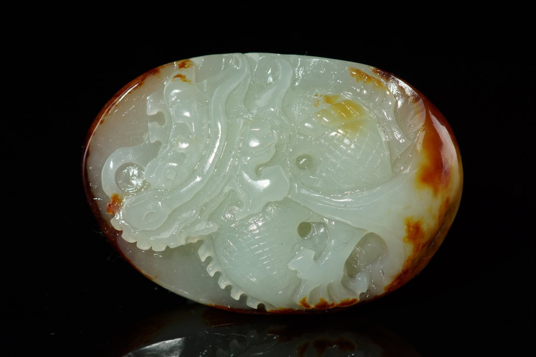Chinese Xinjiang Nephrite Seed Material Pendan: 100% Chinese Xinjiang Hotan seed material pendant, carved with fish design, size: 5.2cm x 3.5cm x 1.8cm.