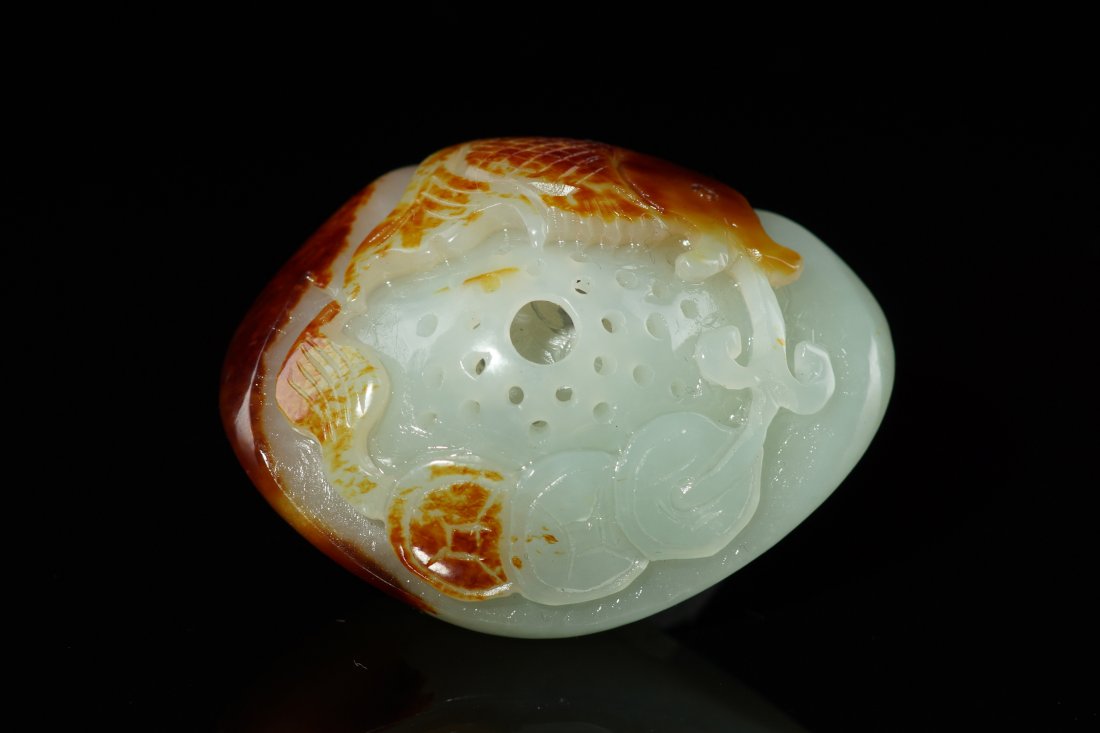 Chinese Xinjiang Nephrite Seed Material Pendan: 100% Chinese Xinjiang Nephrite Seed Material Pendant, carved with fish, lotus and money design, symbol surplus and peace every year, size: 5cm x 3.8cm x 2.5cm, weight: 63.26g.