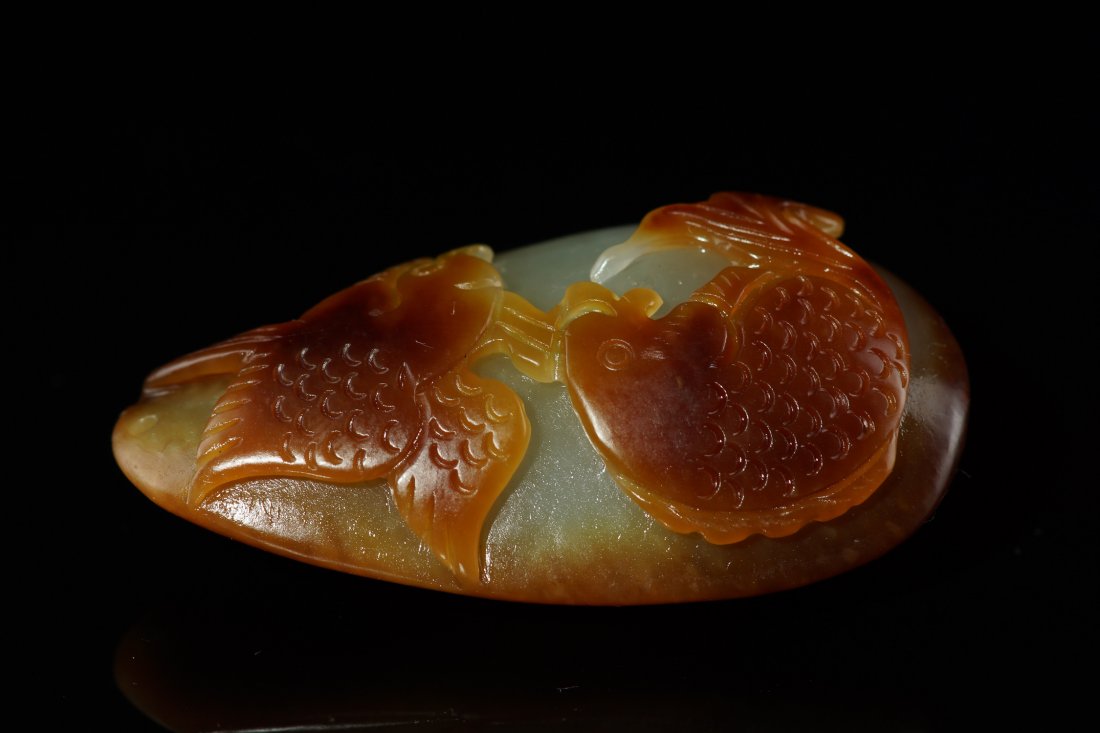 Chinese Xinjiang Nephrite Seed Material Pendant: 100% Chinese Xinjiang Nephrite Seed Material Pendant, carved with two fishes design, symbol surplus and peace every year, size: 5.4cm x 2.8cm x 1.8cm, weight: 42.8g.