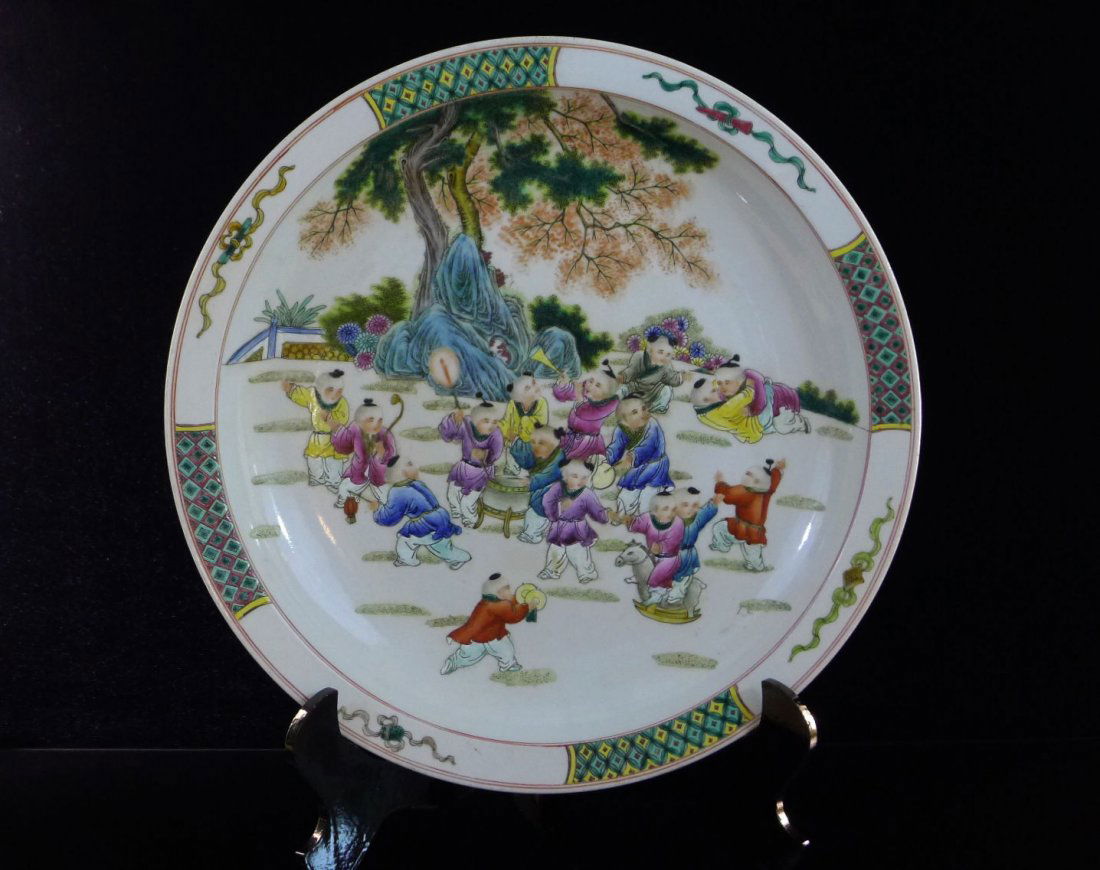 Chinese Famille Rose Porcelain Big Plate Decoration: Chinese Famille Rose Porcelain Big Plate Decoration, the painting with kids play on the yard, also design the gourd, fan, sword, lotus, flower pots, fish drum, flute, yin and yang board are outside, m