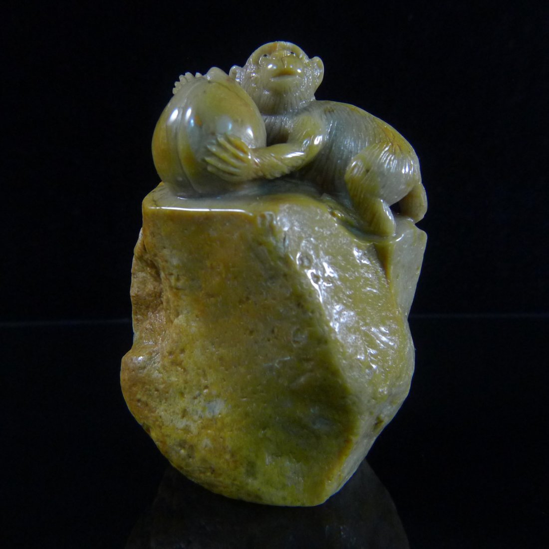 CHINESE SHOU-SHAN STONE STAMP MATERIAL: Chinese Shou-shan stone stamp material, very beautiful and fine carved with the monkey hold the peach on the top of stone, 4" height, weight: 540g.