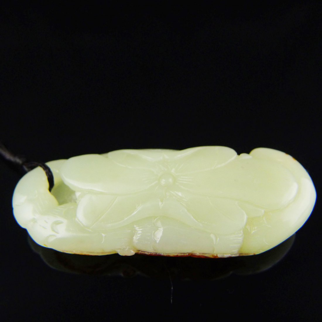 CHINESE NEPHRITE PENDANT: Chinese Nephrite Pendant, seed material, engraved fine pattern with lotus, fish and bat, size: 2.8" x 1.1" x 0.6", weight: 42.21 g.