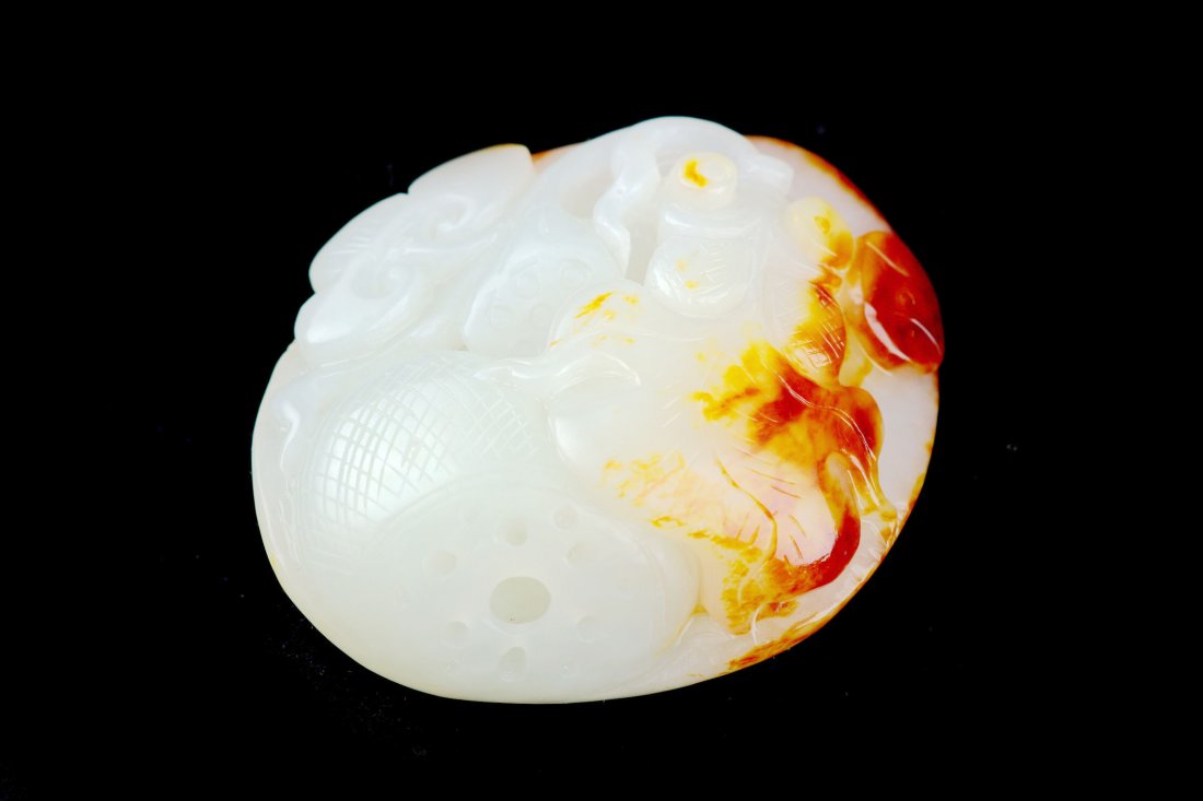 CHINESE WHITE JADE CARVED PENDANT: Chinese white jade carved pendant, seed material with fish, money, lotus and ruyi, size: 2.15 x 1.8 x 0.97", weight: 81.74 g.