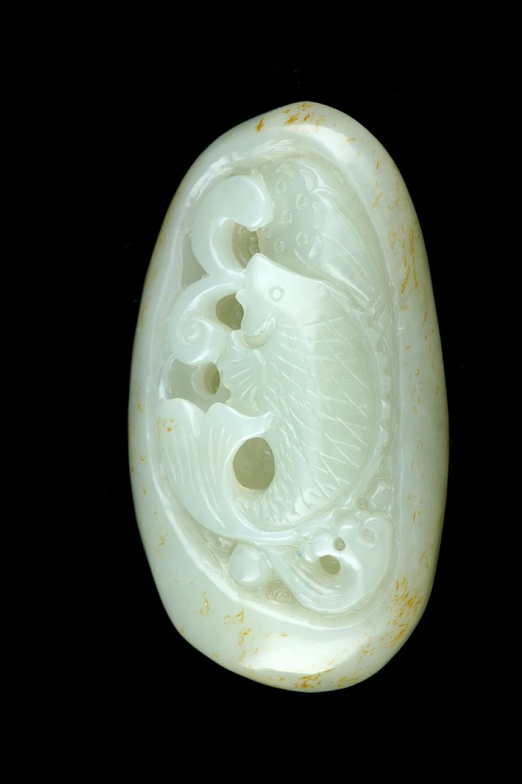 CHINESE WHITE JADE CARVED PENDANT: Chinese white jade carved pendant, design with fish and lotus, size: 2.48 x 1.49 x 0.69", weight: 69.78 g.